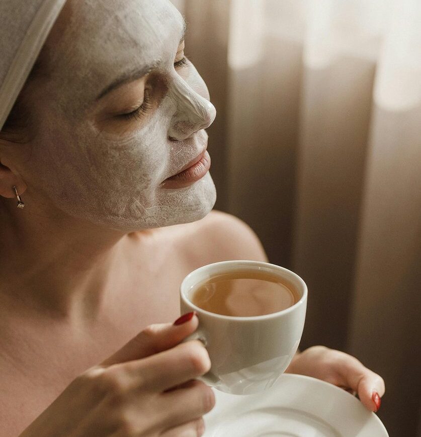 young-woman-having-face-massage-relaxing-spa-salon 1
